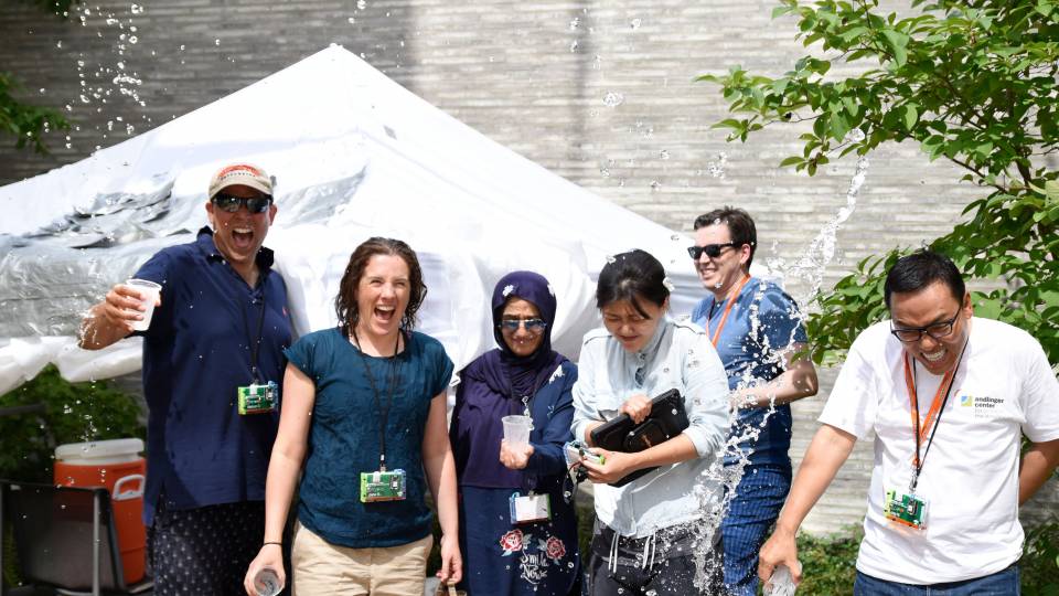Andlinger Center Young Global Leaders pour water over themselves