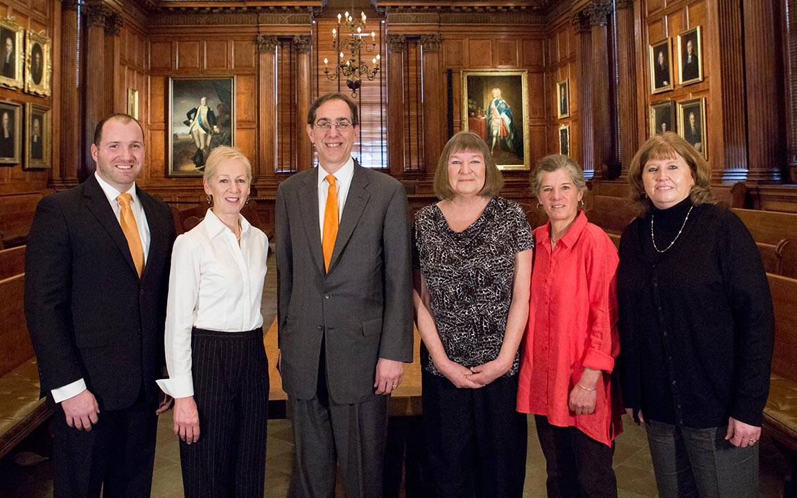Christopher L. Eisgruber stands with award winners