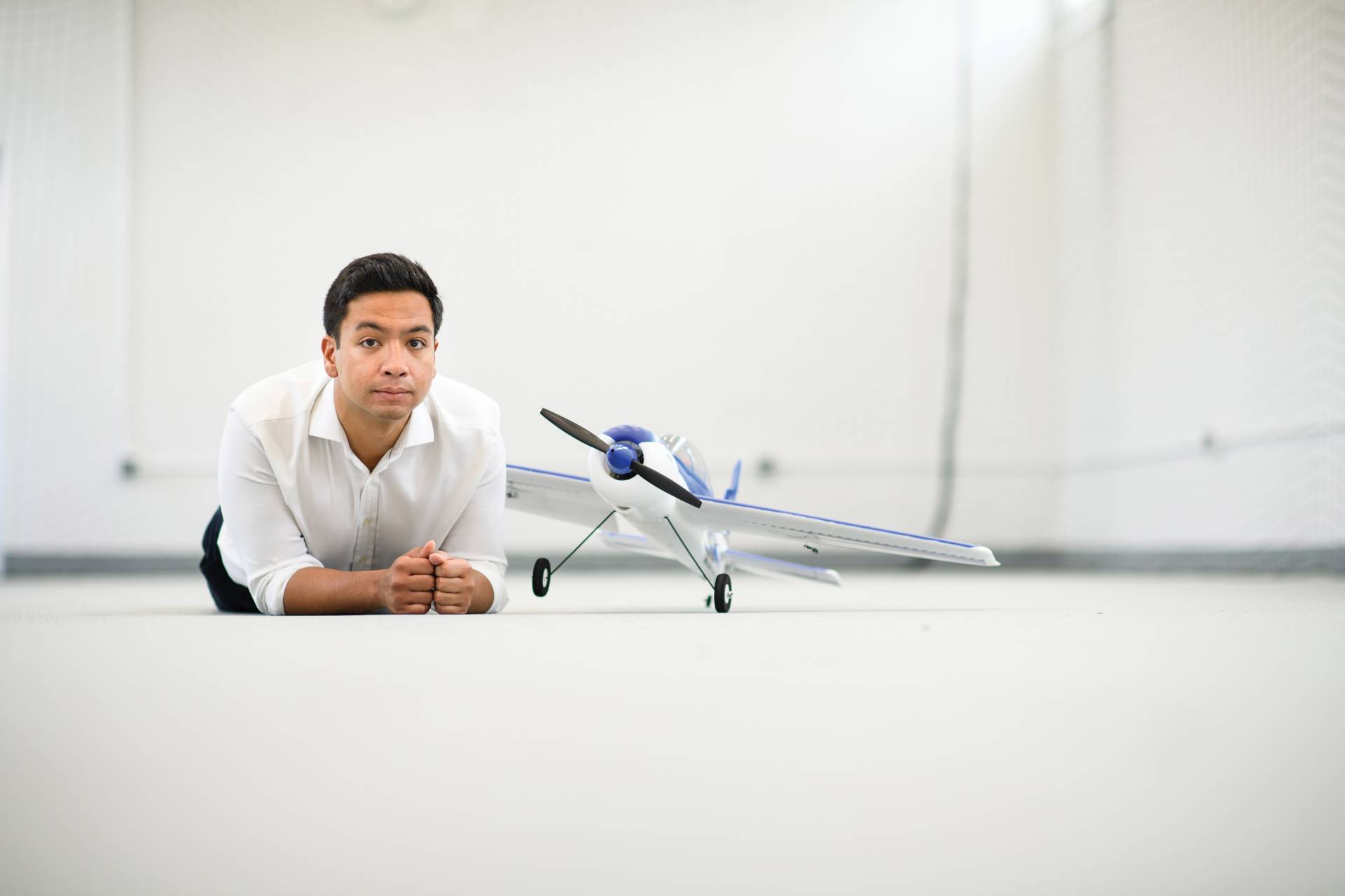 Anirudha Majumdar with a drone airplane