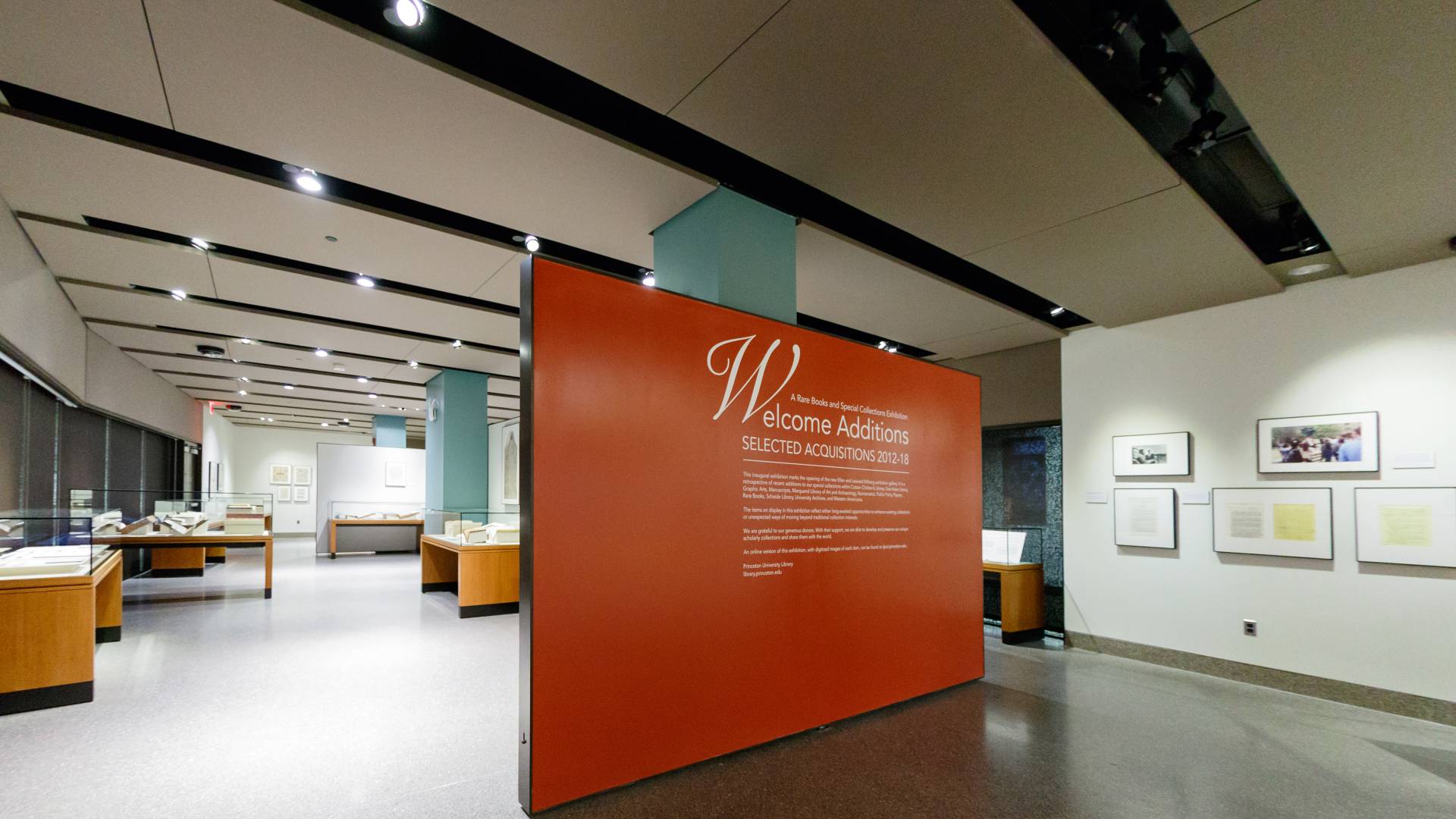 Orange wall with writing marking entrance to Milberg Gallery