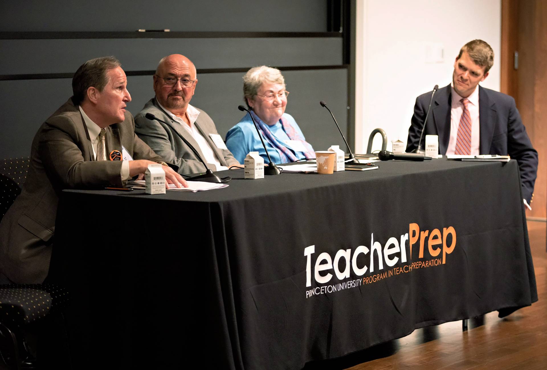 Kent speaks on a panel with 3 others