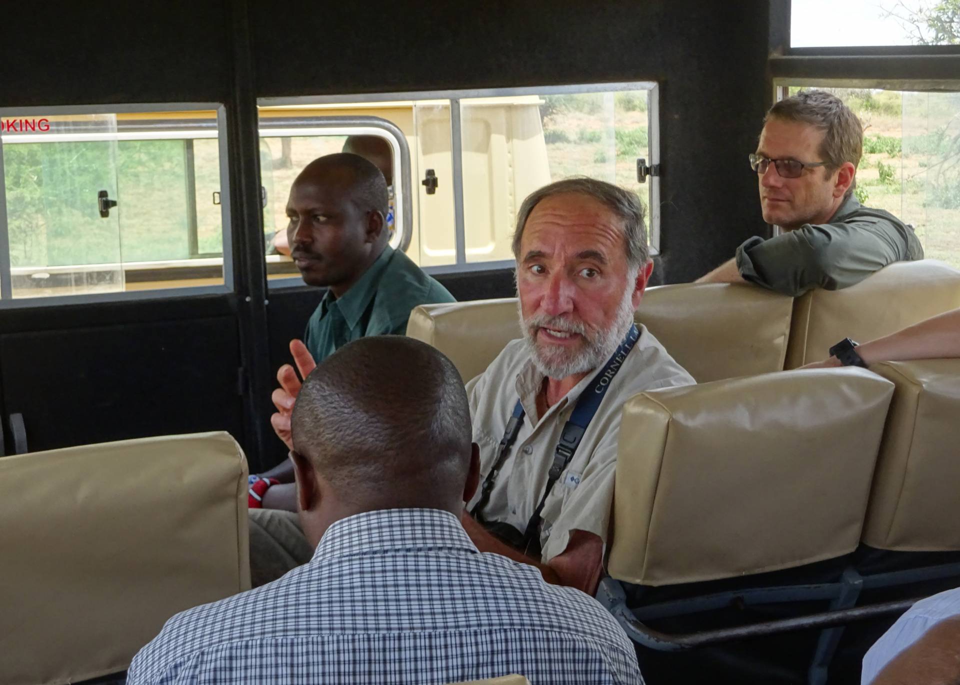Daniel Rubensteinspeaking to a busful of people