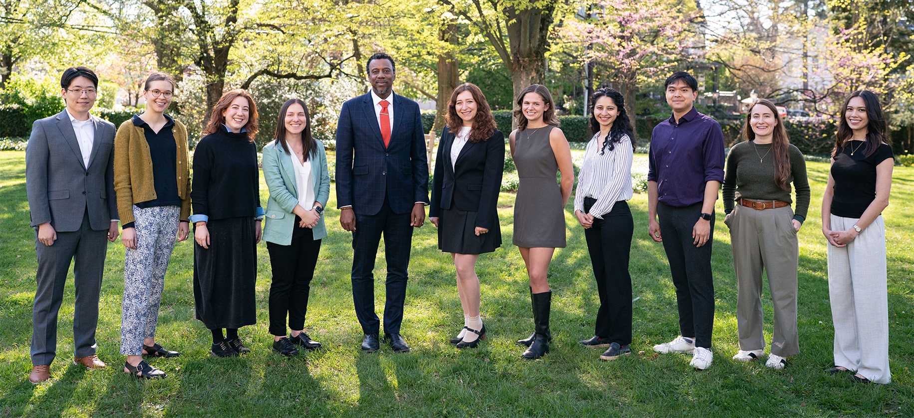 Graduate School Dean Rodney Priestley poses with the honorees.